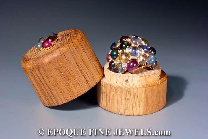 An impressive sapphire and diamond bombé ring